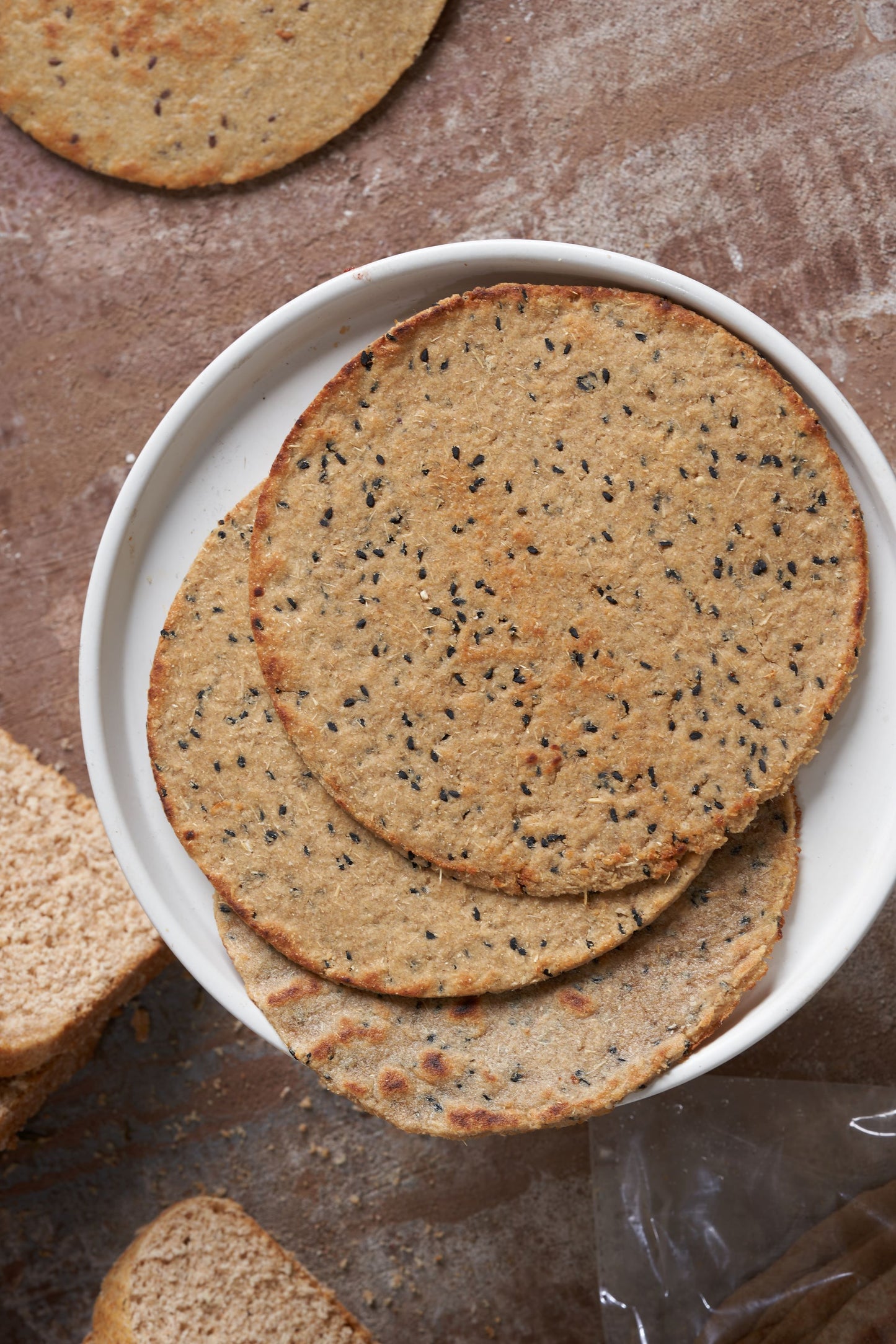 Barely & oatmeal flat bread with yogurt and nigella seeds (5 pieces) خبز صاج الشعير والشوفان بالزبادي وحبة البركة